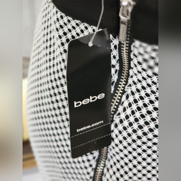 Bebe mesh fitted skirt. Black and White. SIZE: Small - Picture 6 of 14